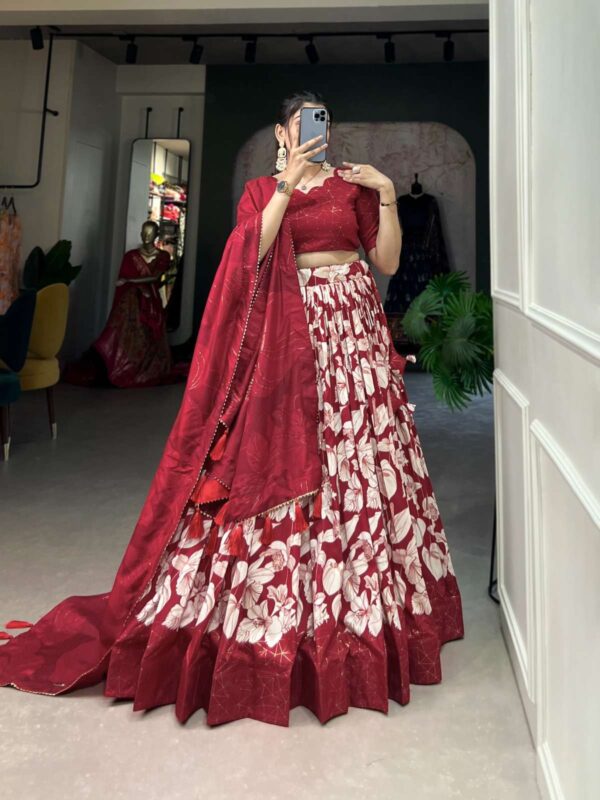 lnb - 1213   lnb 1213 floral printed latest designer wedding wear lehenga supplier surat 0 2025 05 29 13 41 41.jpg lnb 1213 floral printed latest designer wedding wear lehenga supplier surat Catalogue Name : 29th May 2025 Name of Product : lnb - 1213  No of Design : 1 Piece (MOQ : 1 Set) Product Rate Per Piece : ₹ 1400 / Per Piece Product Full Catalogue Rate : ₹ 1400 (GST Extra) Full Catalogue Weight : 1 KG Product Type & Size: semi stitched Product Details: 
					 Lehenga Choli

Transform your ethnic look with our Tussar Silk Printed Lehenga Choli - The beautiful prints on silk fabric make this ensemble a perfect choice for any festive occasion 

LNB1213RED

Lehenga (Stitched)
Lehenga Fabric : Tussar Silk 
Lehenga Work : Floral Print With Foil Print 
Lehenga Waist : SUPPORTED UP TO 42
Lehenga Closer : Drawstring With Heavy Tassels and Zip
Stitching : Stitched With Canvas and attached with Can Can
Length : 42
Flair : 3.80 Meter 
Inner : Micro Cotton

Blouse (Unstitched)
Blouse fabric : Tussar Silk 
Blouse Work : Foil Print
Blouse Length : 0.80 Meter

Dupatta
Dupatta Fabric : Tussar Silk
Dupatta Work : Floral Print With Both Side Tassels
Dupatta Length : 2.5 Meter

Package Contain : Lehenga, Blouse, Dupatta, Drawstring with Zip, Tassels

Weight : 1.250 KG

Rate : 1400