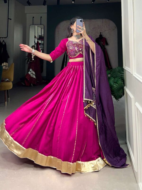 lnb - 1735   lnb 1735 chanderi latest designer navratri wear lehenga supplier surat 2 2025 05 27 16 05 14.jpg lnb 1735 chanderi latest designer navratri wear lehenga supplier surat Catalogue Name : 27th May 2025 Name of Product : lnb - 1735  No of Design : 1 Piece (MOQ : 1 Set) Product Rate Per Piece : ₹ 2250 / Per Piece Product Full Catalogue Rate : ₹ 2250 (GST Extra) Full Catalogue Weight : 1 KG Product Type & Size: semi stitched Product Details: 
					 
Lehenga choli

Navratri nights in Chanderi style 

LNB1735PNK

Lehenga (Stitched)
Lehenga Fabric : Chanderi
Lehenga Work : Plain With Zari Line Gota Patti And Embossed Design Lace Touch Up
Lehenga Waist : Support Up To 42 
Lehenga Closer : Drawstring With Zip
Stitching : Stitched With Canvas And Full Inner
Length : 41
Flair : 6 Meter
Inner : Micro Cotton 

Blouse (Stitched)
Blouse Fabric : Chanderi (Fully Stitched)
Blouse Work : Zari Line Gota Patti With Vintage And Sequins Work With Coin (Ginni) Lace Touch Up
Blouse Size : 38” There is Extra Margin Customer Can Adjust Up to 42
Blouse Length : 15
Sleeve Length : 11

Dupatta
Dupatta Fabric : Chanderi
Dupatta Work : Plain With Vintage And Sequins Work With Coin (Ginni) Lace Touch Up
Dupatta Length : 2.4 Meter

Package Contain : Lehenga, Blouse, Dupatta, Drawstring with Zip, Blouse Tassels

Weight : 1.500 kg

Rate : 2250


Note :- Product Care Instructions : Dry Clean Only