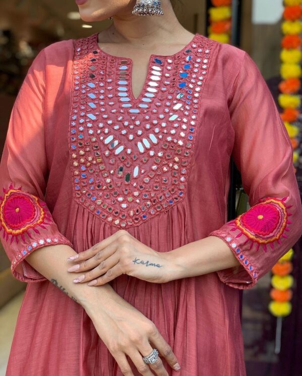 The outfit is made of Masleen cotton giving it a smooth and luxurious feel  The outfit is made of Masleen cotton giving it a smooth and luxurious feel, The outfit is made of Masleen cotton giving it a smooth and luxurious feel surat, The outfit is made of Masleen cotton giving it a smooth and luxurious feel new latest catalog, The outfit is made of Masleen cotton giving it a smooth and luxurious feel wholesale surat, The outfit is made of Masleen cotton giving it a smooth and luxurious feel single, The outfit is made of Masleen cotton giving it a smooth and luxurious feel catalog price, The outfit is made of Masleen cotton giving it a smooth and luxurious feel salwar suit, The outfit is made of Masleen cotton giving it a smooth and luxurious feel dresses, The outfit is made of Masleen cotton giving it a smooth and luxurious feel indian salwar suit, The outfit is made of Masleen cotton giving it a smooth and luxurious feel dress material the outfit is made of masleen cotton giving it a smooth and luxurious feel 13 2025 05 04 19 05 07 
                     The outfit is made of Masleen cotton giving it a smooth and luxurious feel
                     
                     
                     
                     Specification :
                     
                        
                           
						   
								Product Date:
								04-05-2025
							
                             							
								Name:
								The Outfit Is Made Of Masleen Cotton Giving It A Smooth And Luxurious Feel
							
																					
								Cname:
								Outfit
							
														
								Brand:
								
							
							
														
								Total Design:
								1 Pcs
							
														
														
								Per Piece Rate:
								INR 899
							
														
														
								Full Catalog Rate:
								INR 899								+ (5 % GST) + Shipping Charge
								
							
														
														
								Weight:
								1 Kg
							
																					
								Moq:
								Minimum 1 Pcs
							
														
														
														
								Type:
								Single Kurtis
							
														
							
							
														
								Fabric:
								
									Muslin								
							
																																																								
														
														
														
								Other Details:
								Our Exclusive Collection is here, 💃🏻 To add a touch of tradition to your wardrobe.😍

Beautiful 🤩 Colors
🧡💜🧡💜🧡💜🧡💜

The outfit is made of Masleen cotton giving it a smooth and luxurious feel. 🥰The set includes a long kurti, matching pants, and a dupatta. 🌸Embroidery & Mirror Work in kurti features intricate  mirror work on the neckline, 🌹adding a striking appeal. The sleeves have embroidery and mirror work near the cuffs, 🪻enhancing the design. The pants have embroidery and mirror work on the bottom side, making them visually appealing. 🤩The outfit is in a beautiful purple & pinkish-red shade, perfect for festive and ethnic occasions.

Length:- ''44”

Size :- M(38)
             L (40)
             Xl (42)
             Xxl (44)
             3xl. (46)

Price :- 899

Ready to ship 🚢 
Multiple pic available