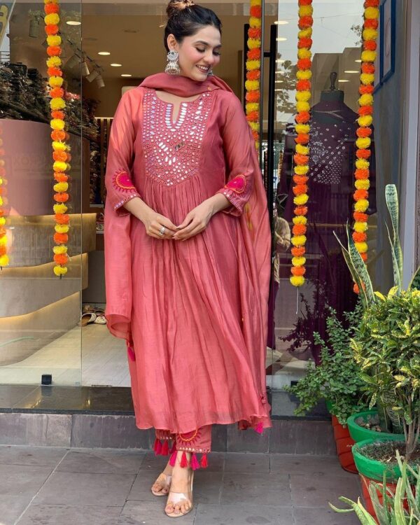 The outfit is made of Masleen cotton giving it a smooth and luxurious feel  The outfit is made of Masleen cotton giving it a smooth and luxurious feel, The outfit is made of Masleen cotton giving it a smooth and luxurious feel surat, The outfit is made of Masleen cotton giving it a smooth and luxurious feel new latest catalog, The outfit is made of Masleen cotton giving it a smooth and luxurious feel wholesale surat, The outfit is made of Masleen cotton giving it a smooth and luxurious feel single, The outfit is made of Masleen cotton giving it a smooth and luxurious feel catalog price, The outfit is made of Masleen cotton giving it a smooth and luxurious feel salwar suit, The outfit is made of Masleen cotton giving it a smooth and luxurious feel dresses, The outfit is made of Masleen cotton giving it a smooth and luxurious feel indian salwar suit, The outfit is made of Masleen cotton giving it a smooth and luxurious feel dress material the outfit is made of masleen cotton giving it a smooth and luxurious feel 5 2025 05 04 19 05 06 
                     The outfit is made of Masleen cotton giving it a smooth and luxurious feel
                     
                     
                     
                     Specification :
                     
                        
                           
						   
								Product Date:
								04-05-2025
							
                             							
								Name:
								The Outfit Is Made Of Masleen Cotton Giving It A Smooth And Luxurious Feel
							
																					
								Cname:
								Outfit
							
														
								Brand:
								
							
							
														
								Total Design:
								1 Pcs
							
														
														
								Per Piece Rate:
								INR 899
							
														
														
								Full Catalog Rate:
								INR 899								+ (5 % GST) + Shipping Charge
								
							
														
														
								Weight:
								1 Kg
							
																					
								Moq:
								Minimum 1 Pcs
							
														
														
														
								Type:
								Single Kurtis
							
														
							
							
														
								Fabric:
								
									Muslin								
							
																																																								
														
														
														
								Other Details:
								Our Exclusive Collection is here, 💃🏻 To add a touch of tradition to your wardrobe.😍

Beautiful 🤩 Colors
🧡💜🧡💜🧡💜🧡💜

The outfit is made of Masleen cotton giving it a smooth and luxurious feel. 🥰The set includes a long kurti, matching pants, and a dupatta. 🌸Embroidery & Mirror Work in kurti features intricate  mirror work on the neckline, 🌹adding a striking appeal. The sleeves have embroidery and mirror work near the cuffs, 🪻enhancing the design. The pants have embroidery and mirror work on the bottom side, making them visually appealing. 🤩The outfit is in a beautiful purple & pinkish-red shade, perfect for festive and ethnic occasions.

Length:- ''44”

Size :- M(38)
             L (40)
             Xl (42)
             Xxl (44)
             3xl. (46)

Price :- 899

Ready to ship 🚢 
Multiple pic available