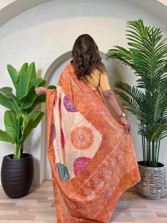 pr kesariya tissue silk weaving bandhani prints best saree in wholesale surat 12 2025 11 18 16 50 48 pr kesariya tissue silk weaving bandhani prints best saree in wholesale surat Rehmat Boutique pr kesariya tissue silk weaving bandhani prints best saree in wholesale surat - Image 13